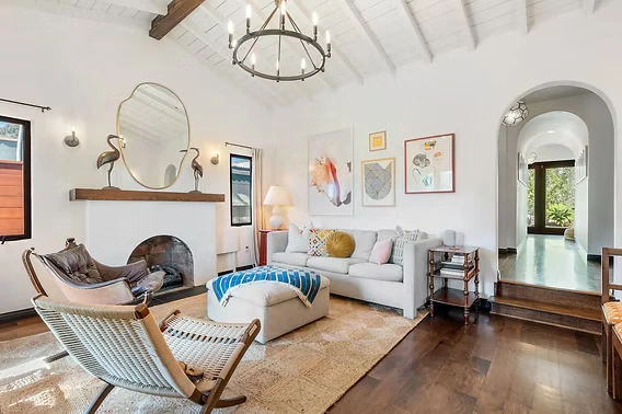 A furnished short-term rental living room set up for guests