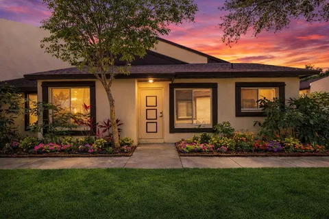 A property owner comparing short-term rental and landlord insurance policies